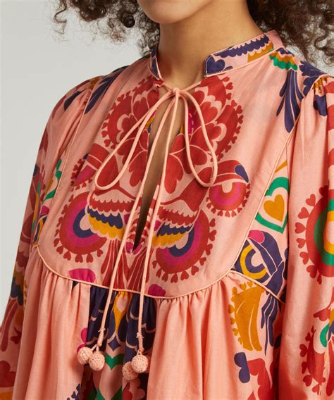 The Peach Amulet Midi Dress: A Sustainable Fashion Choice